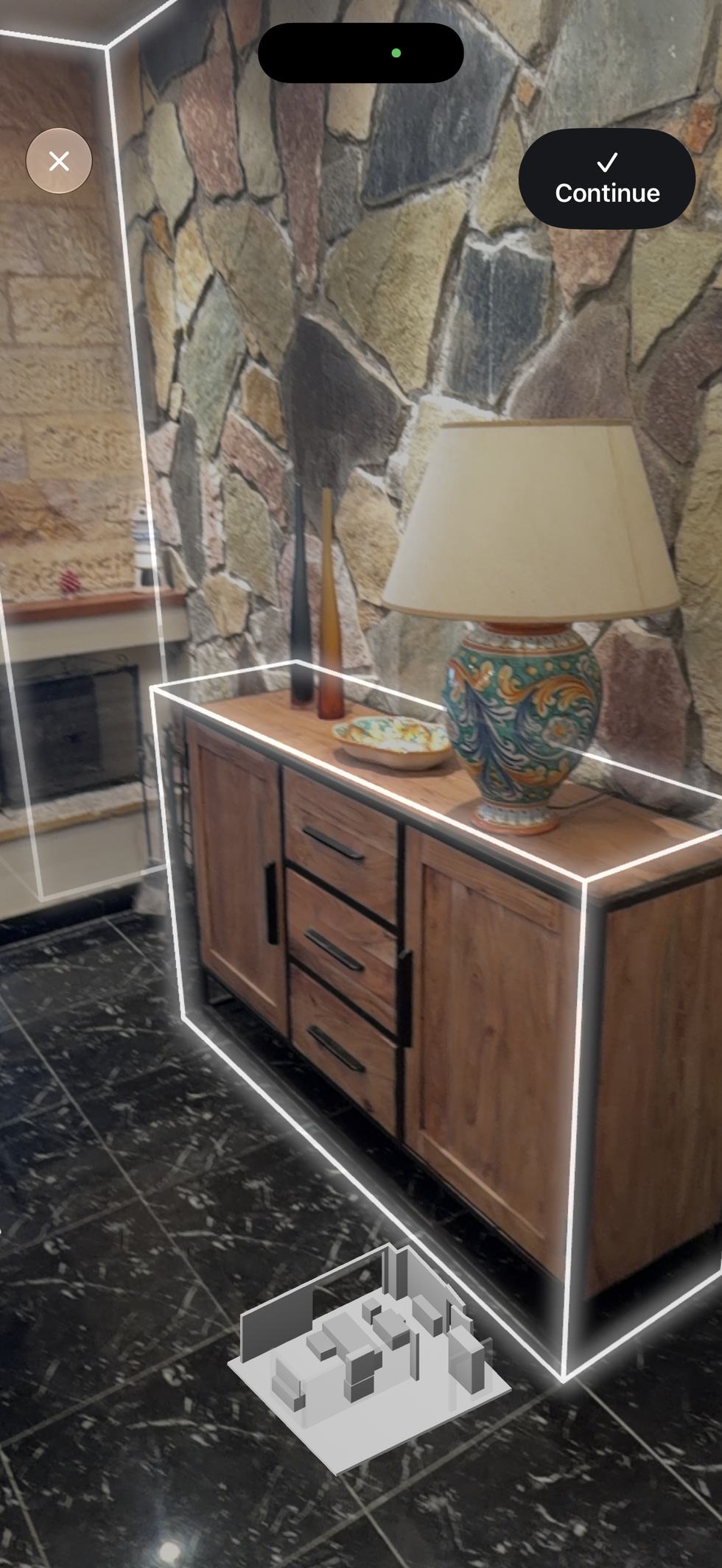 Whery scanning a room and outlining a sideboard in augmented reality